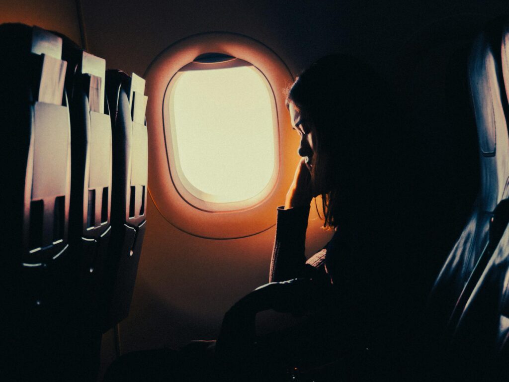 abstract photograph of a woman sleeping in an aircraft